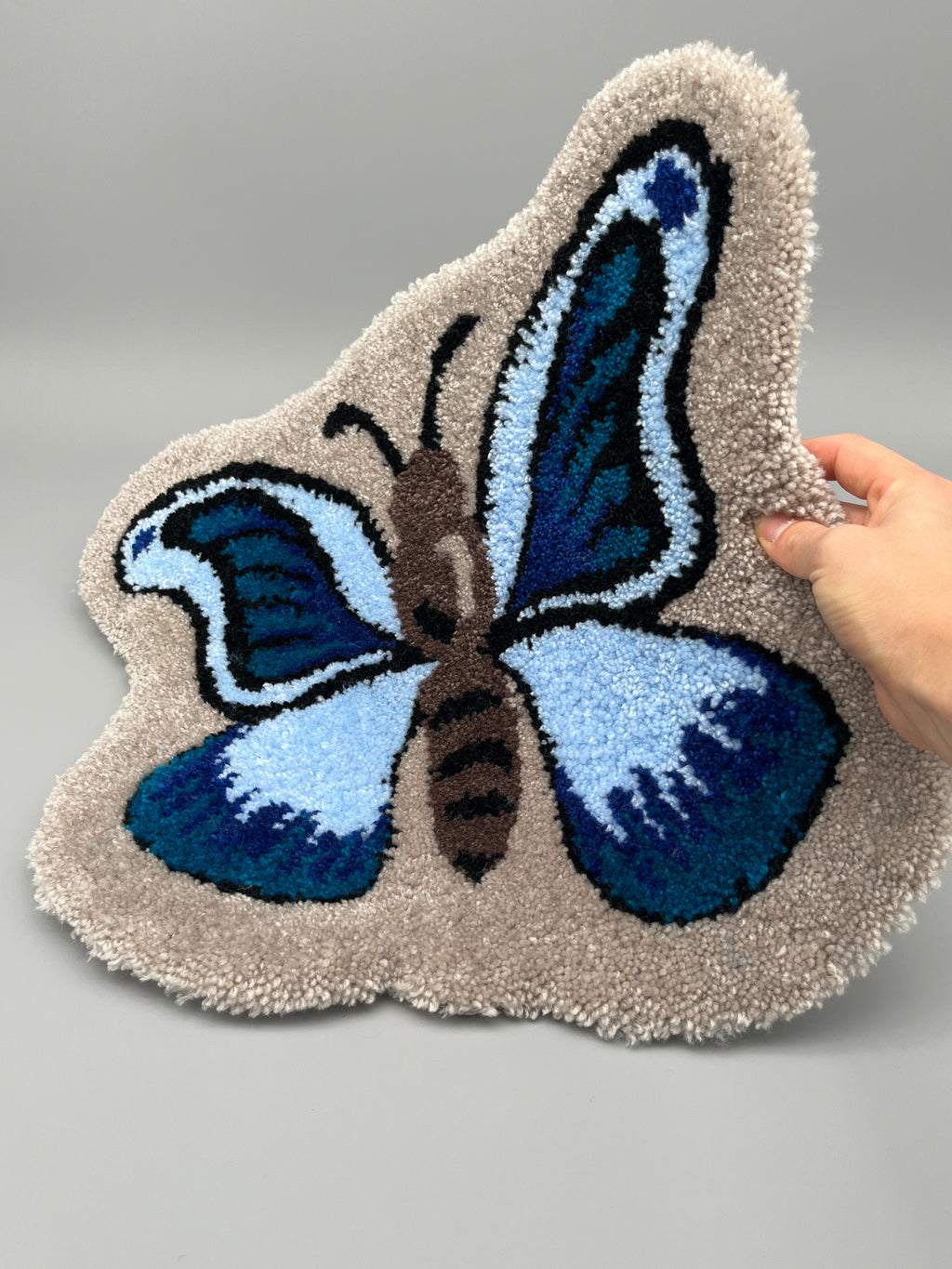 Handgefertigter Teppich, Schmetterling